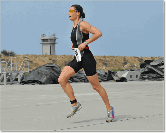A woman running in a speedsuit